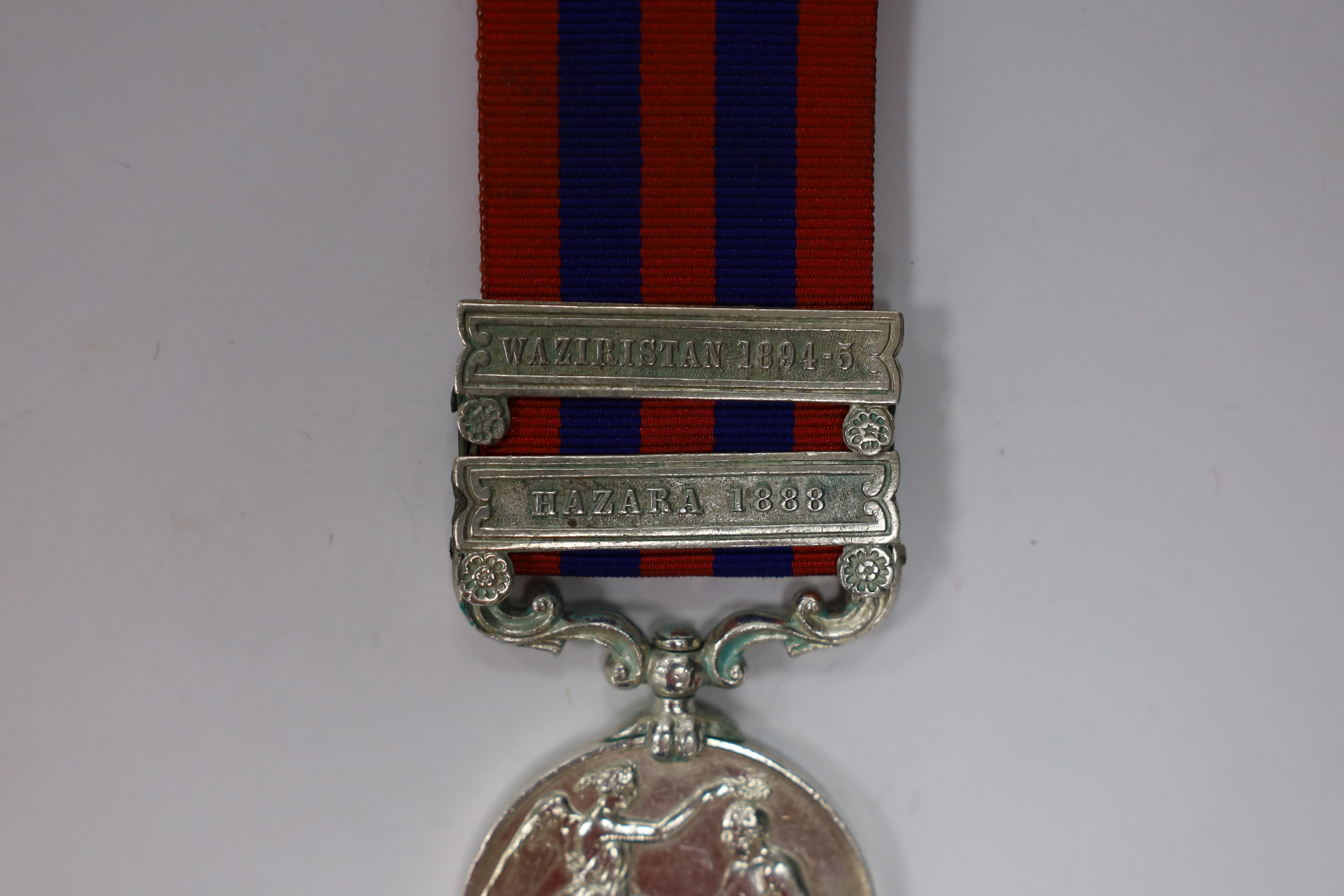 An India General Service Medal with Waziristan 1894-5 and Hazara 1888 clasps to 1158 Sepoy Gulab Singh 14th Bt Infy